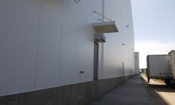 Small awning over delivery door