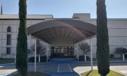 Awning covering building entrance